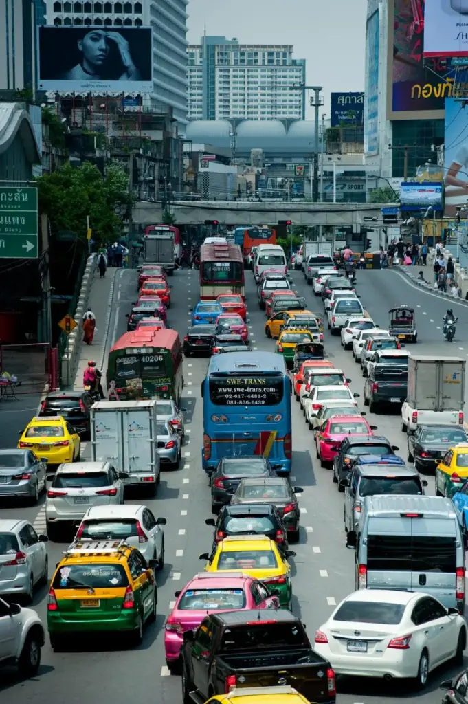 Aerial view of a busy highway interchange with vehicles traveling on multiple lanes