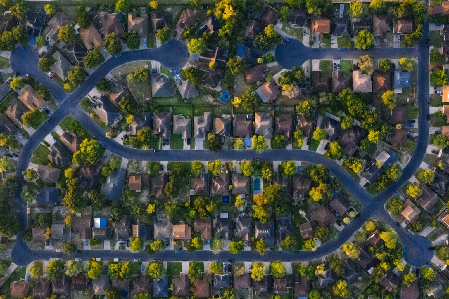 Aerial view of a Texas residential neighborhood showing property boundaries, streets, and lot lines