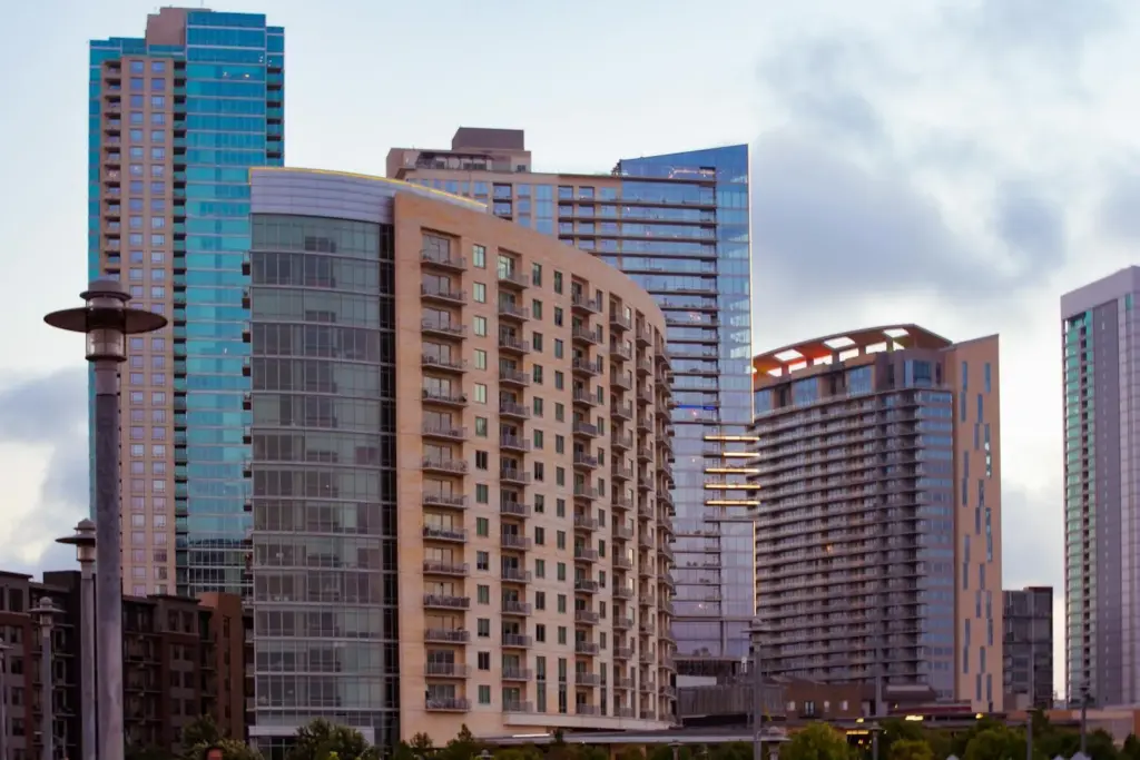 Austin Texas skyline with modern downtown buildings against a cloudy sky