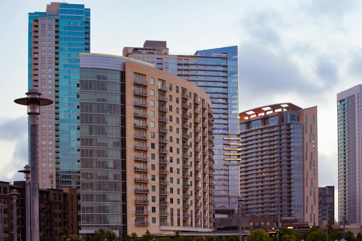 Austin Texas skyline with modern downtown buildings against a cloudy sky