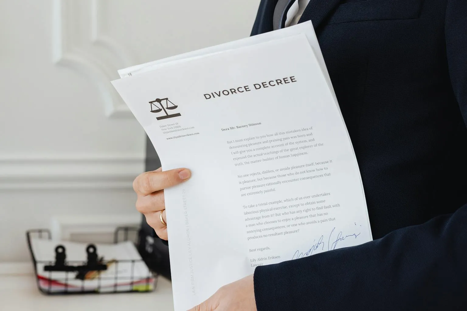 Legal documents, deeds, and contracts spread across a professional desk for mineral rights review