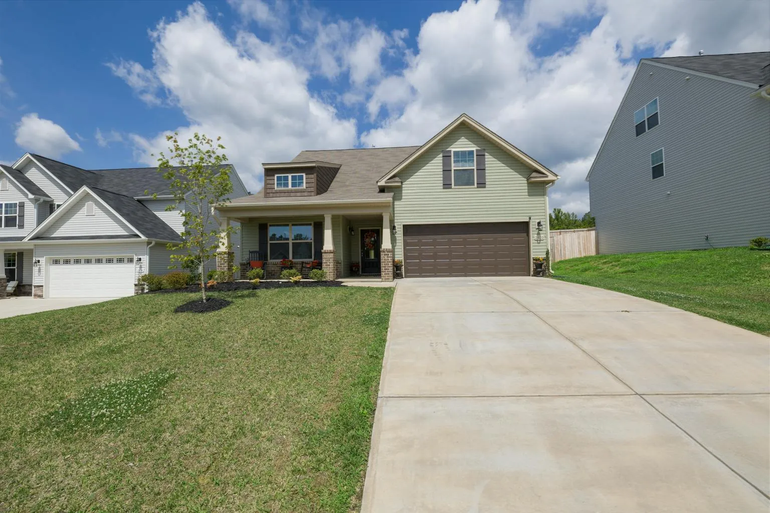 Modern suburban rental property with well-maintained exterior and driveway