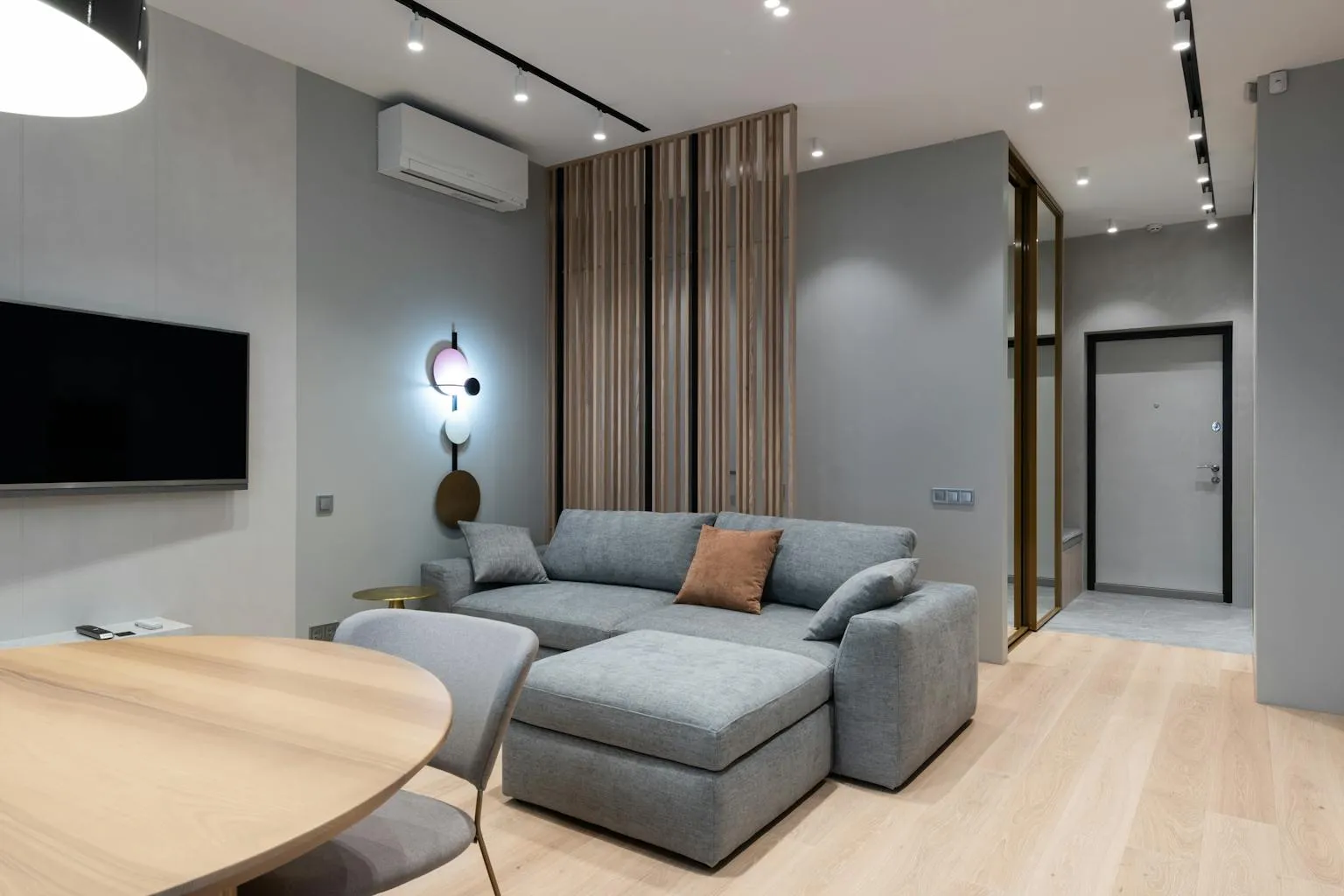 Modern furnished living room interior of a rental property with contemporary decor