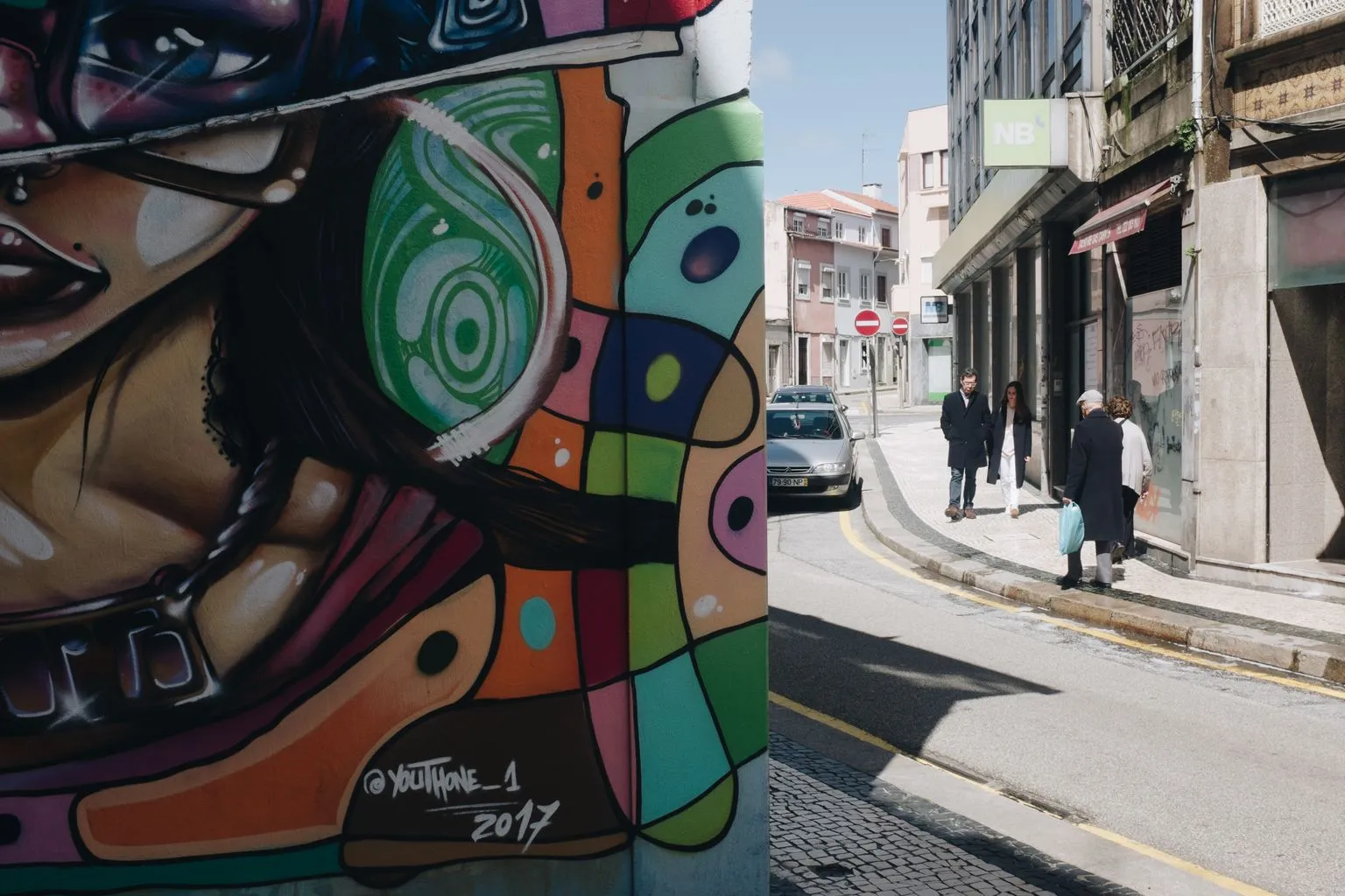 Vibrant street art graffiti mural covering the exterior of an urban building