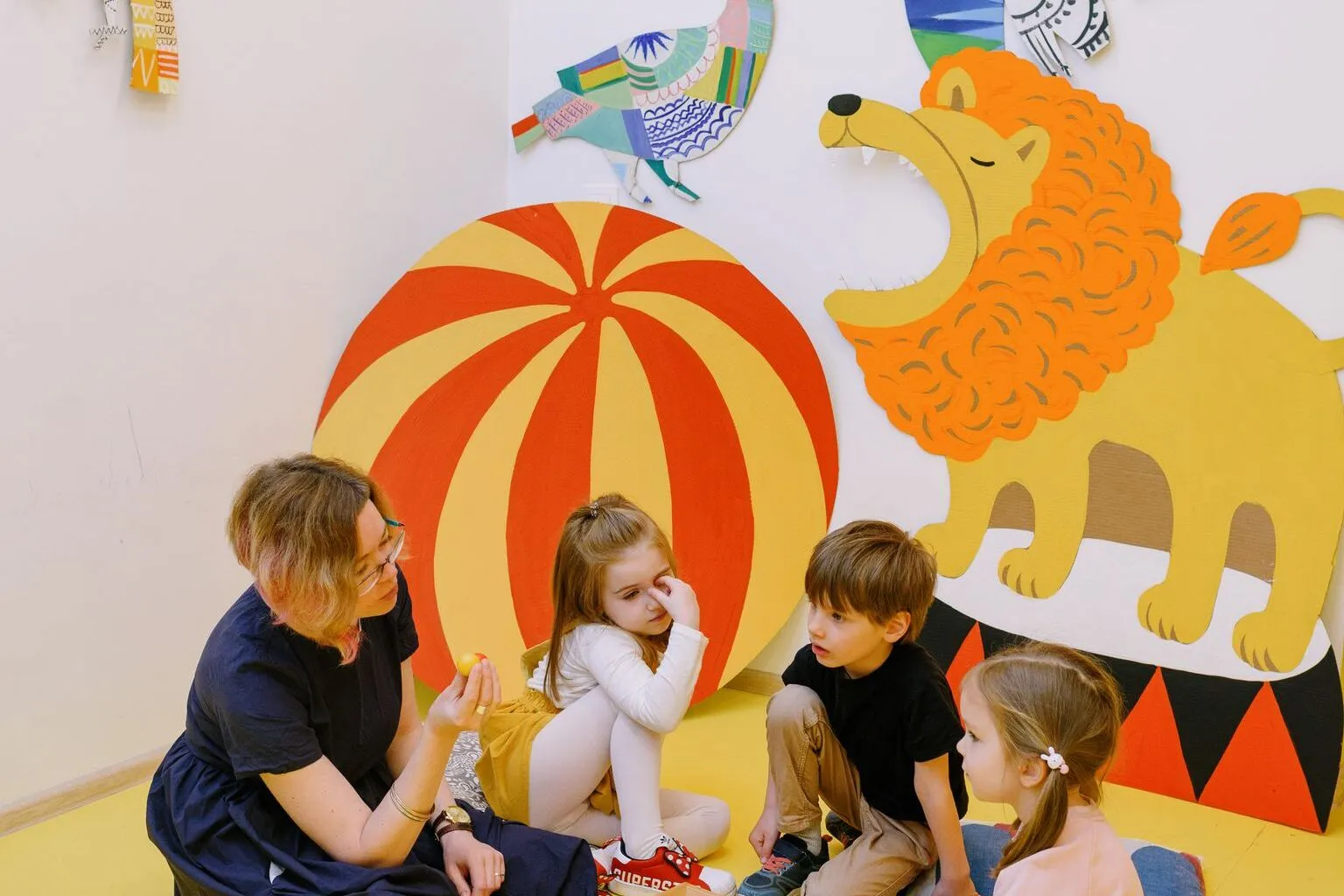 Teacher engaging with young child in an Austin early childhood education program