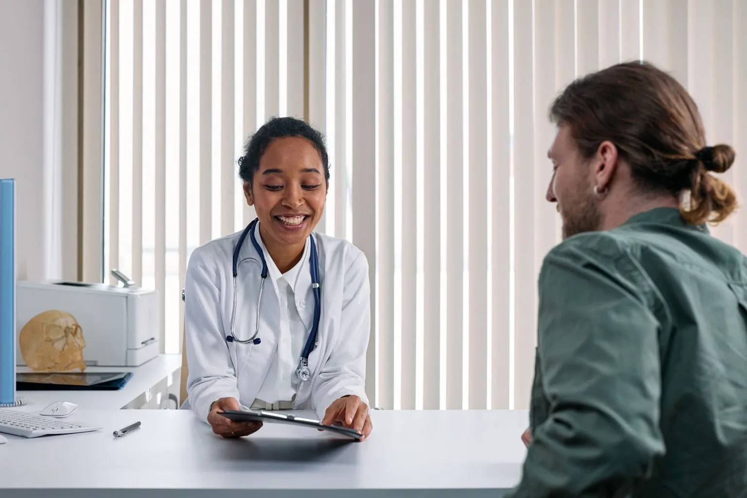Healthcare provider discussing treatment options with patient