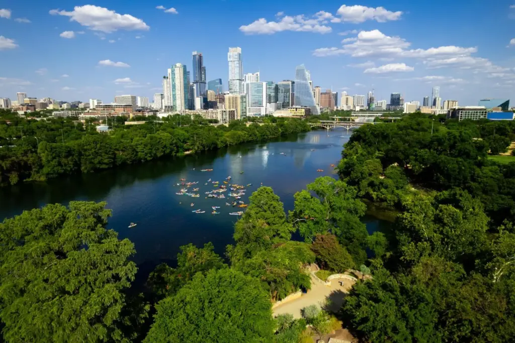 Aerial view of Austin Texas skyline with skyscrapers along the Colorado River