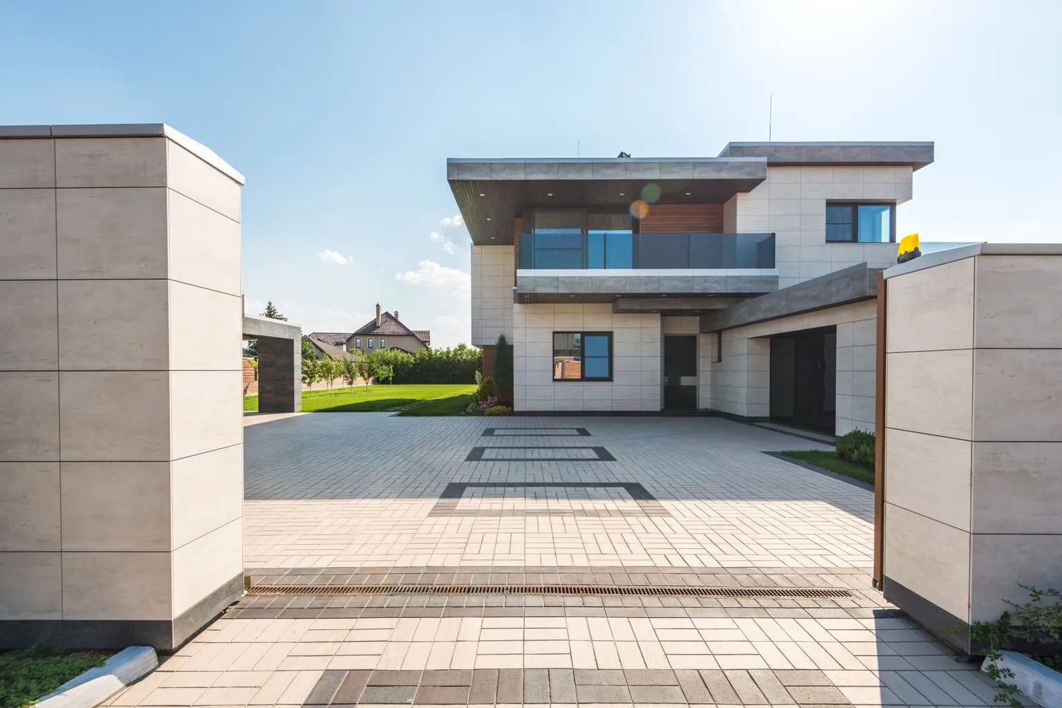 Modern two-story suburban home with spacious driveway and professional landscaping