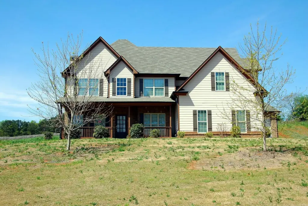 Two-story suburban home with spacious lawn and front porch suited for multigenerational living