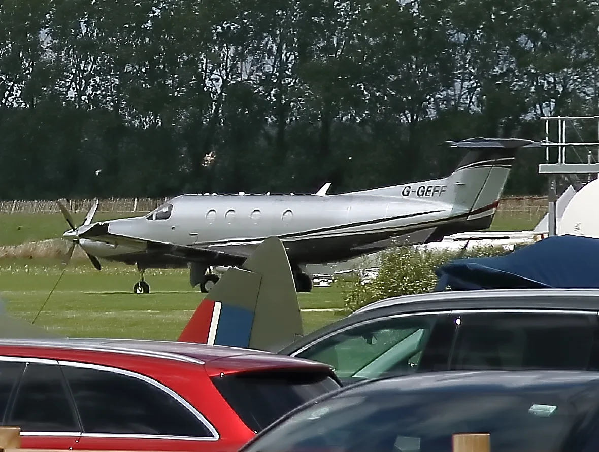 A Pilatus PC-12 single-engine turboprop on the ramp