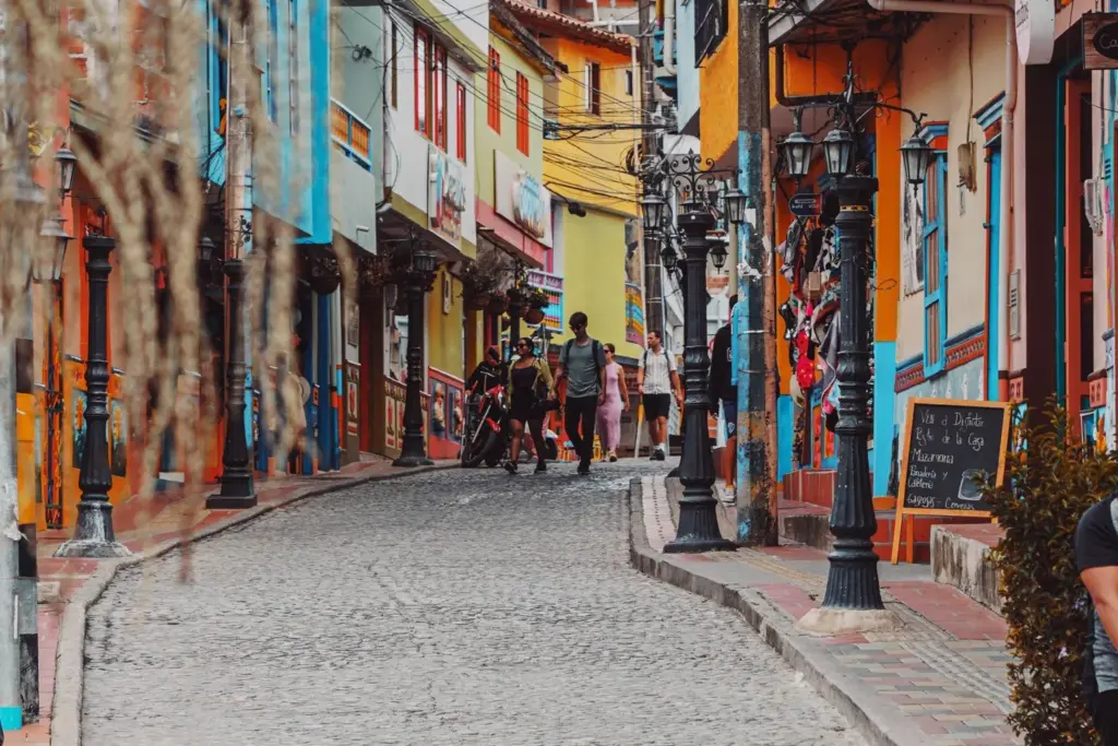 Colorful walkable street in Austin neighborhood with shops and pedestrians